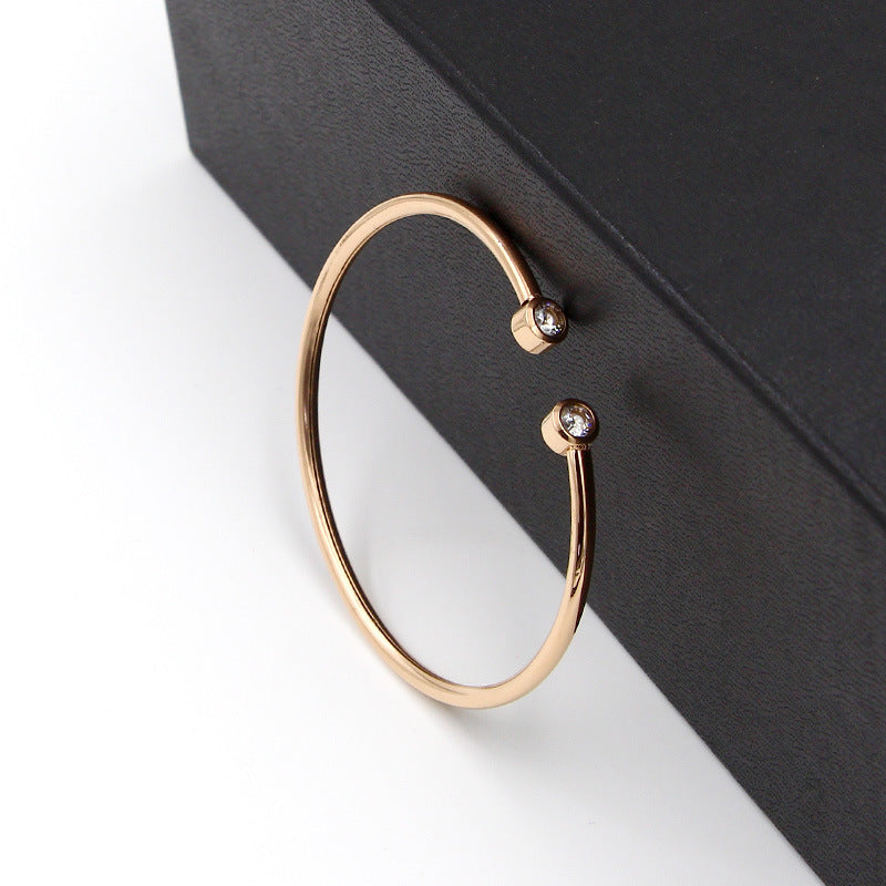 Open Gold Bracelet with Twin Crystals