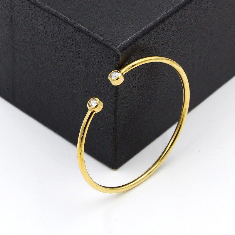 Open Gold Bracelet with Twin Crystals