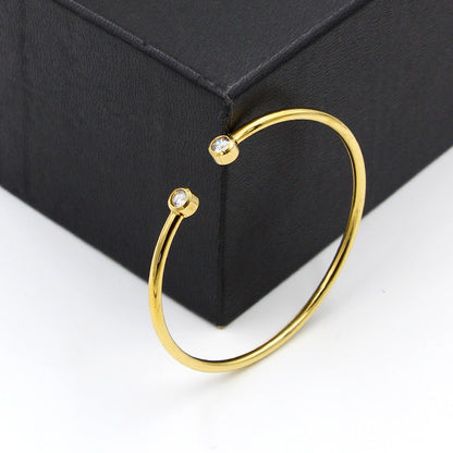 Open Gold Bracelet with Twin Crystals