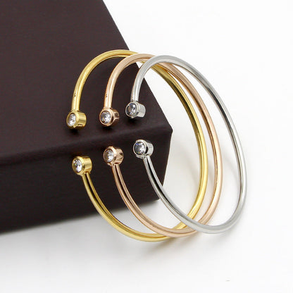Open Gold Bracelet with Twin Crystals