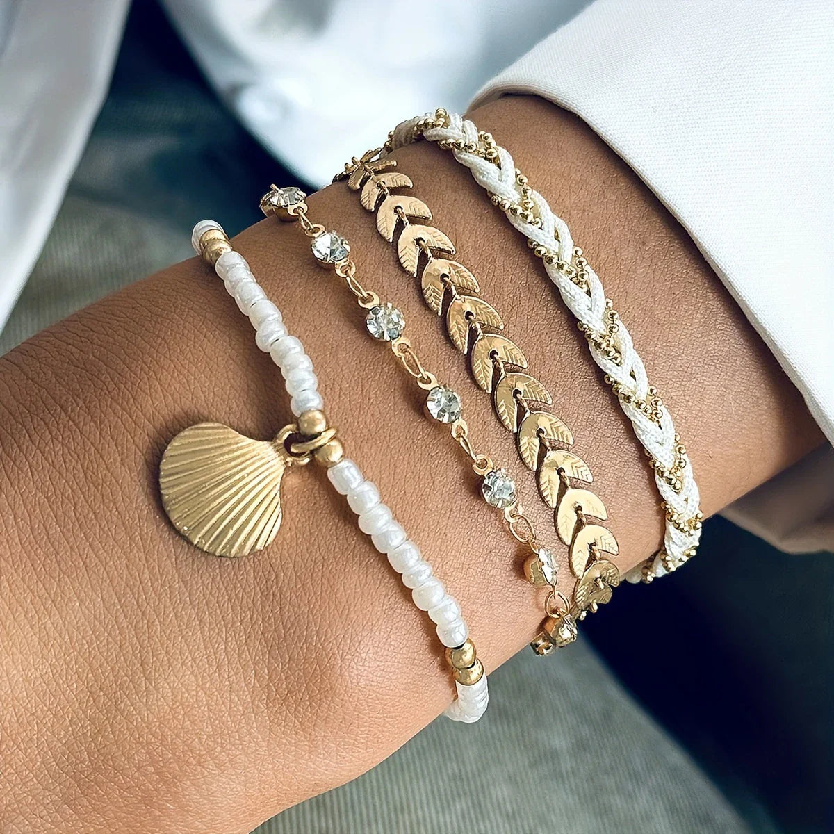 Set of 4 Elegant Gold Shell Bracelets