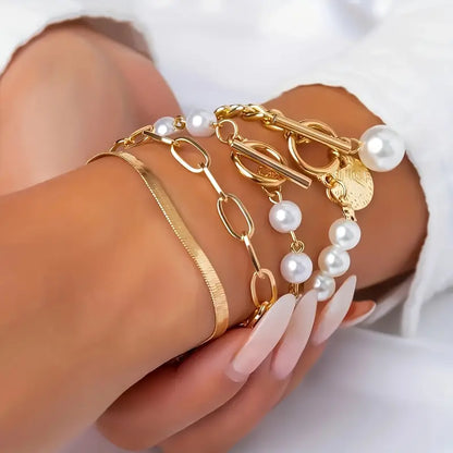 Chic Gold 4-Piece Bracelet Set â€“ Snake, Pearls & Links | Gold