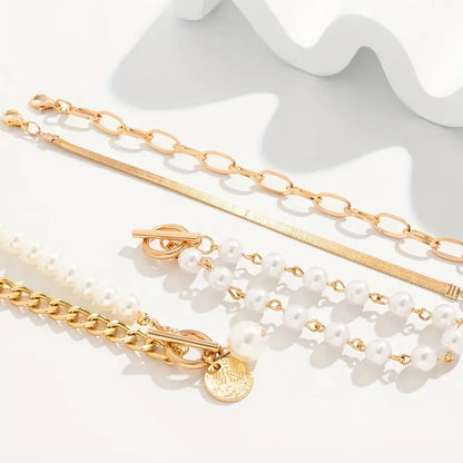 Chic Gold 4-Piece Bracelet Set â€“ Snake, Pearls & Links | Gold