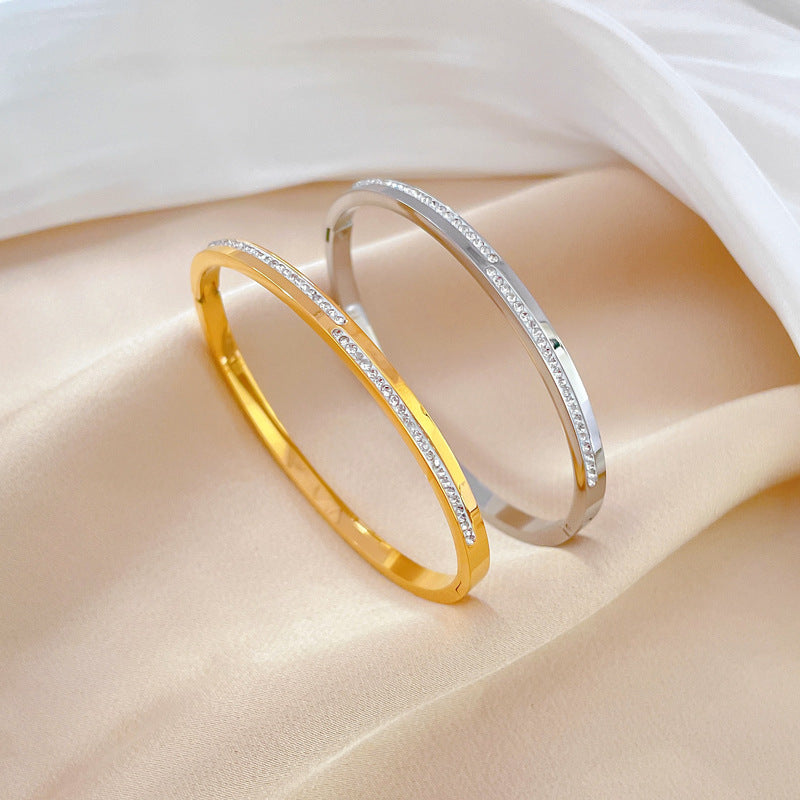 Aera Rigid Gold Crystal Bracelet