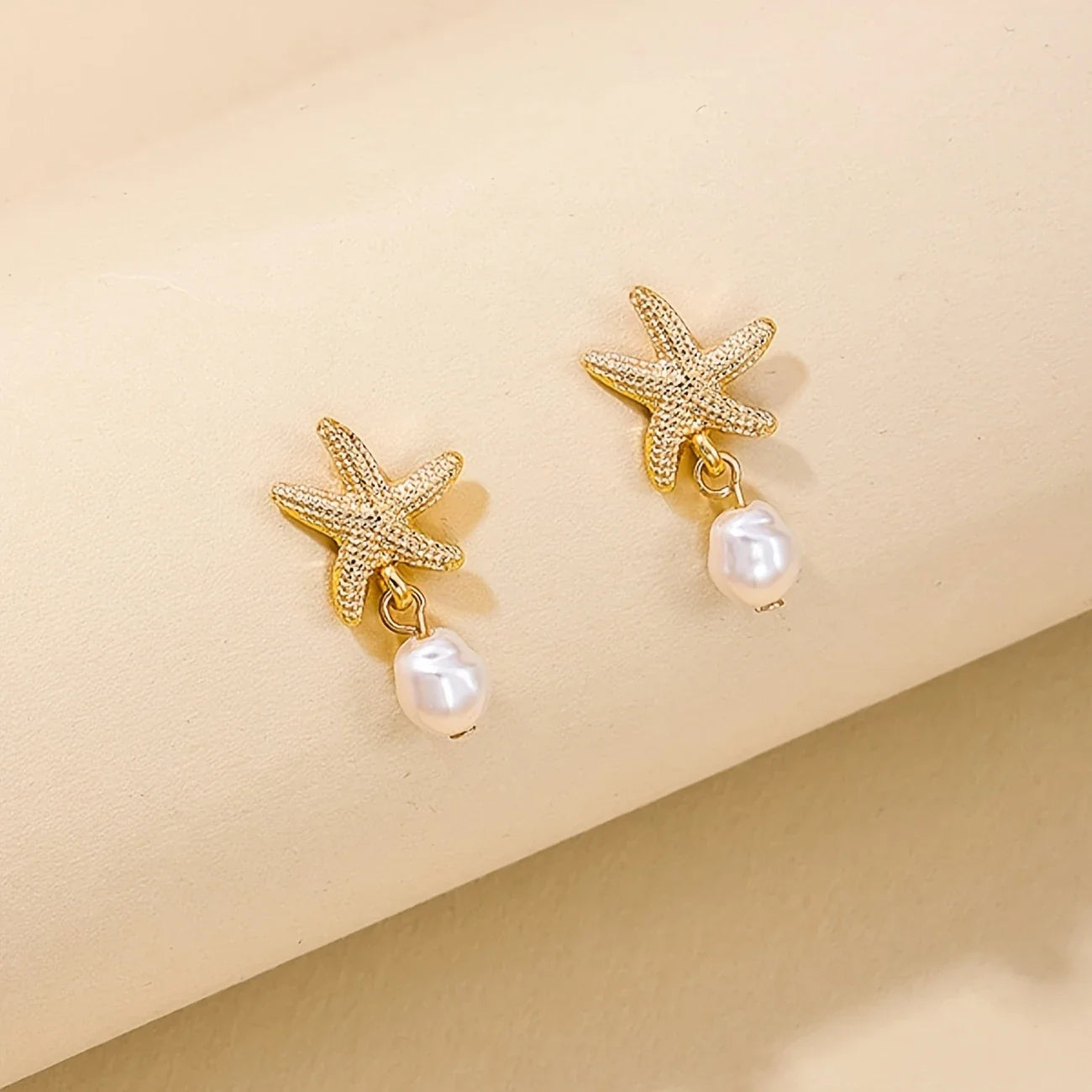 Elegant Starfish Earrings with Pearl Tassel