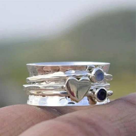 Elegant Rotating Heart Silver Ring
